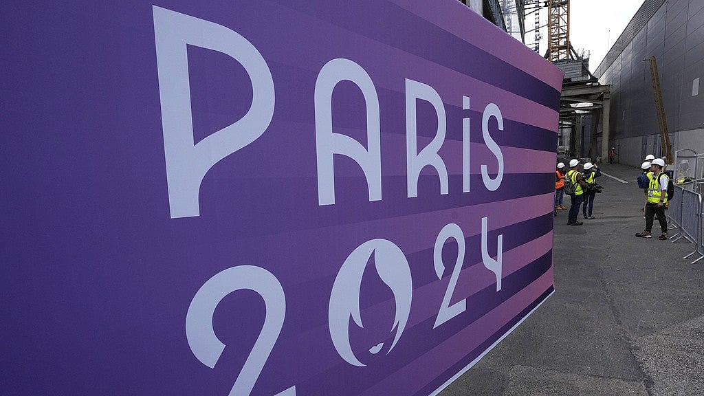 Journalists visit the South Paris Arena ahead of the 2024 Summer Olympic Games. - AP